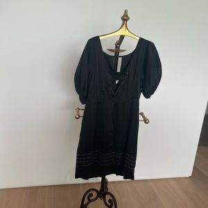 Short cocktail dress with coloured sequence zipper in the back